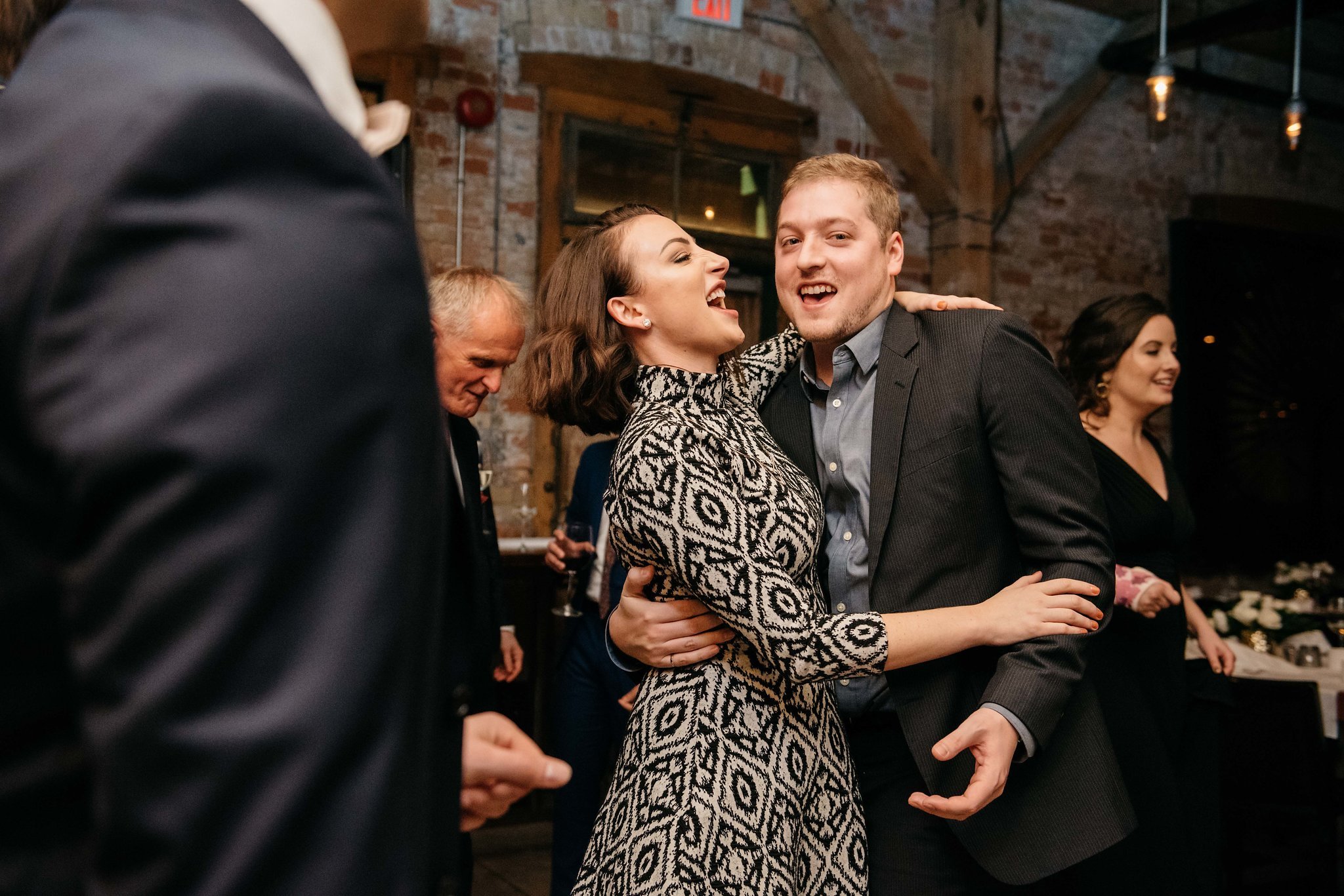 Groom celebrating on dance floor