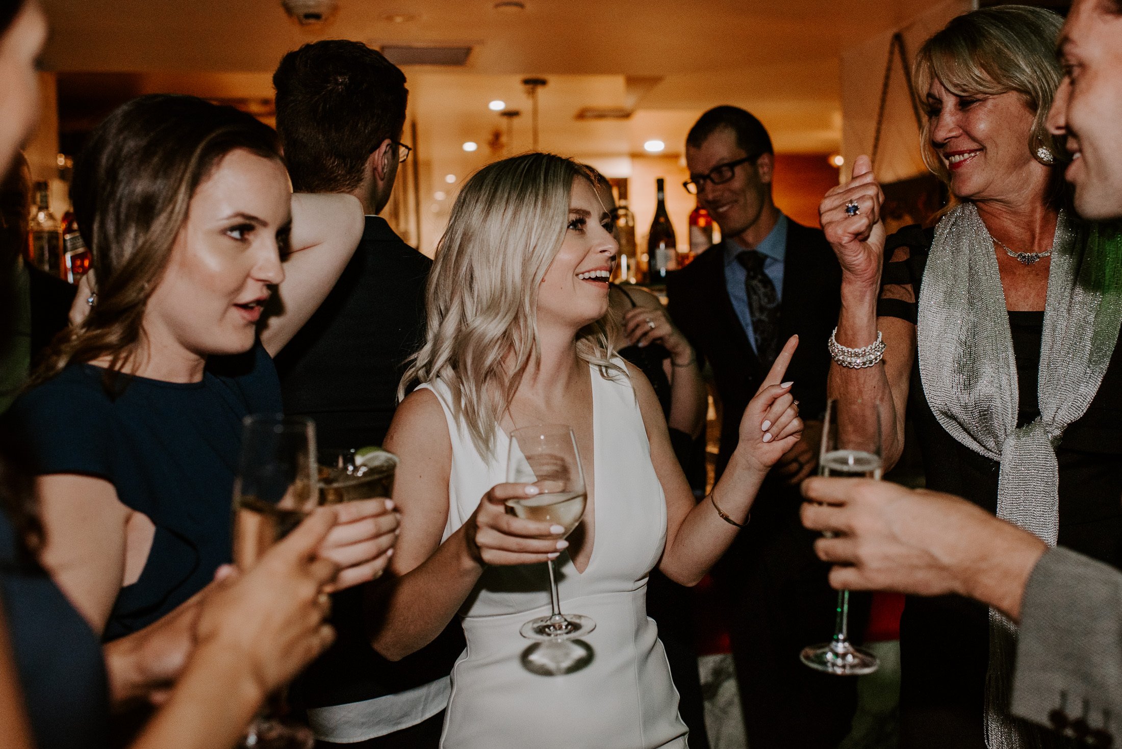 Wedding party guests enjoying the night